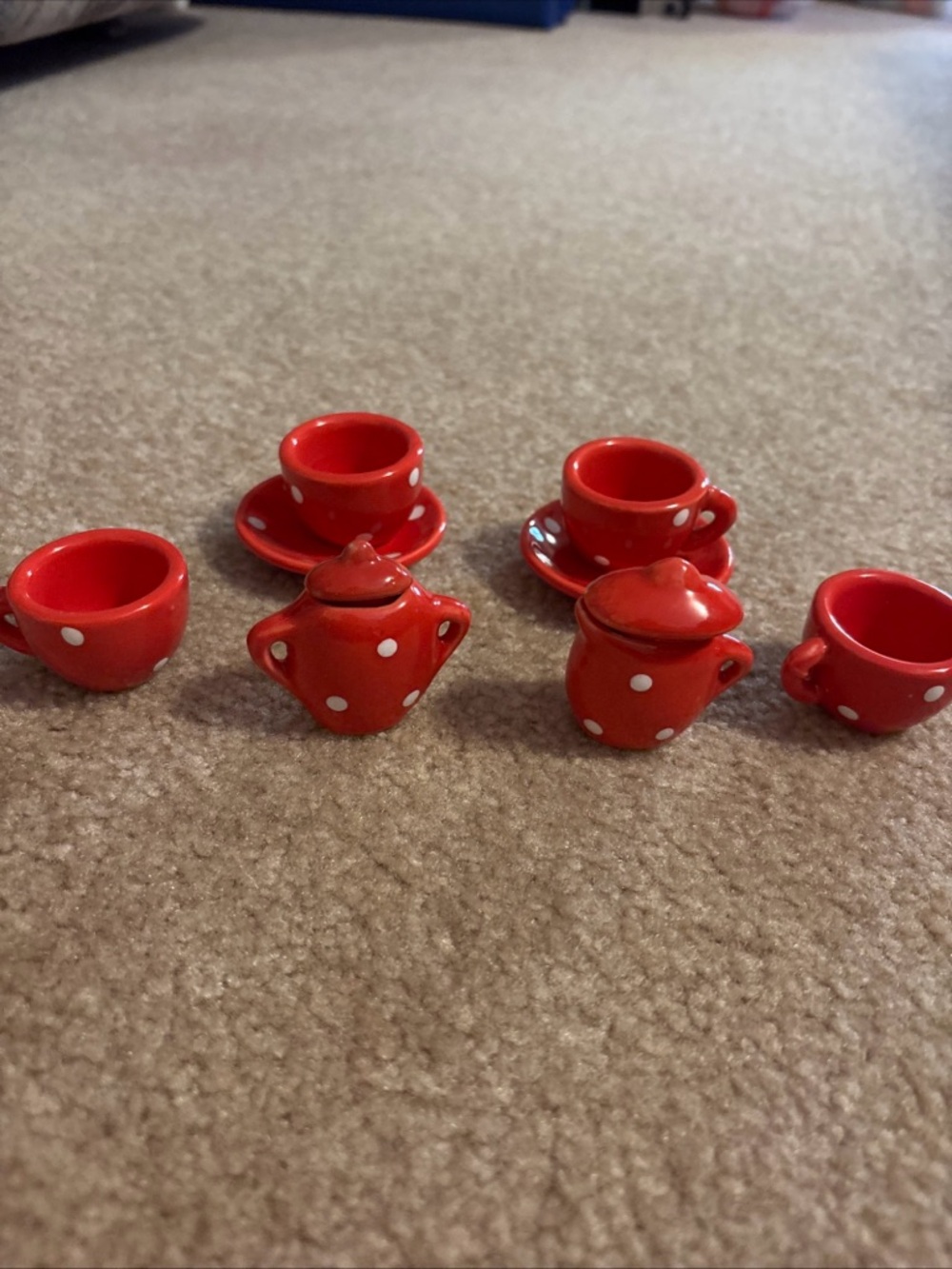 Lot Of 10 miniature porcelain tea set Moulin Roty featuring a red design w/white